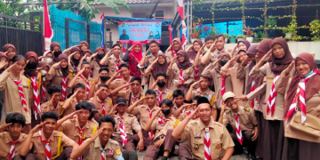 Kwartir Ranting Pondok Melati Sinergi dengan Masyarakat Menggelar Bakti Sosial